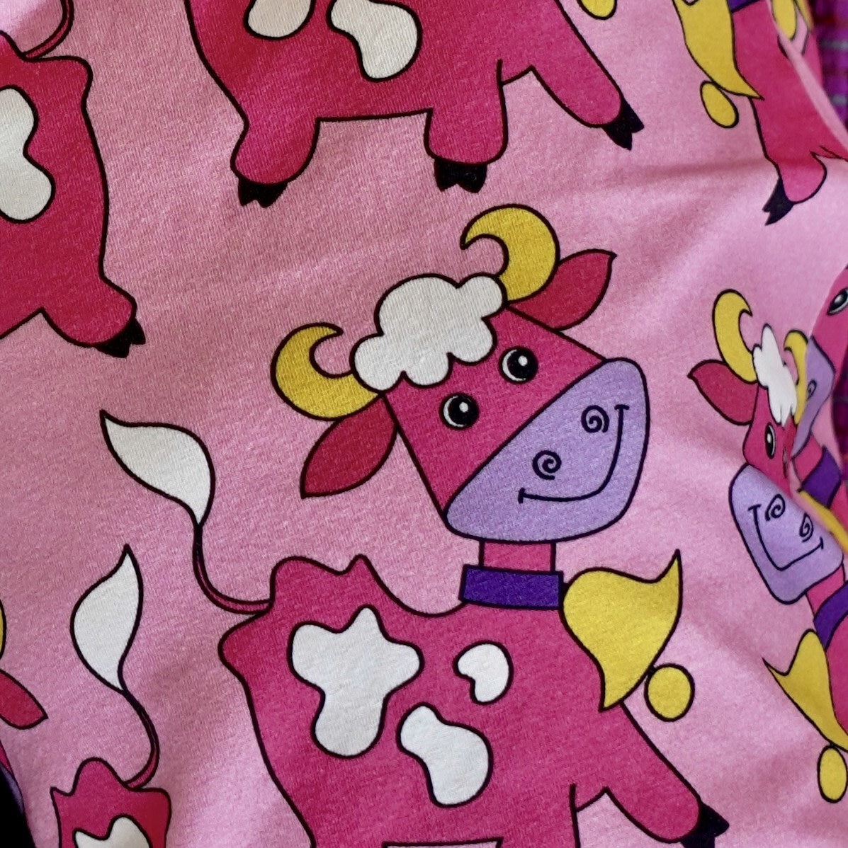 Short-sleeved romper with cows