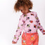 Long-sleeved ladybug blouse