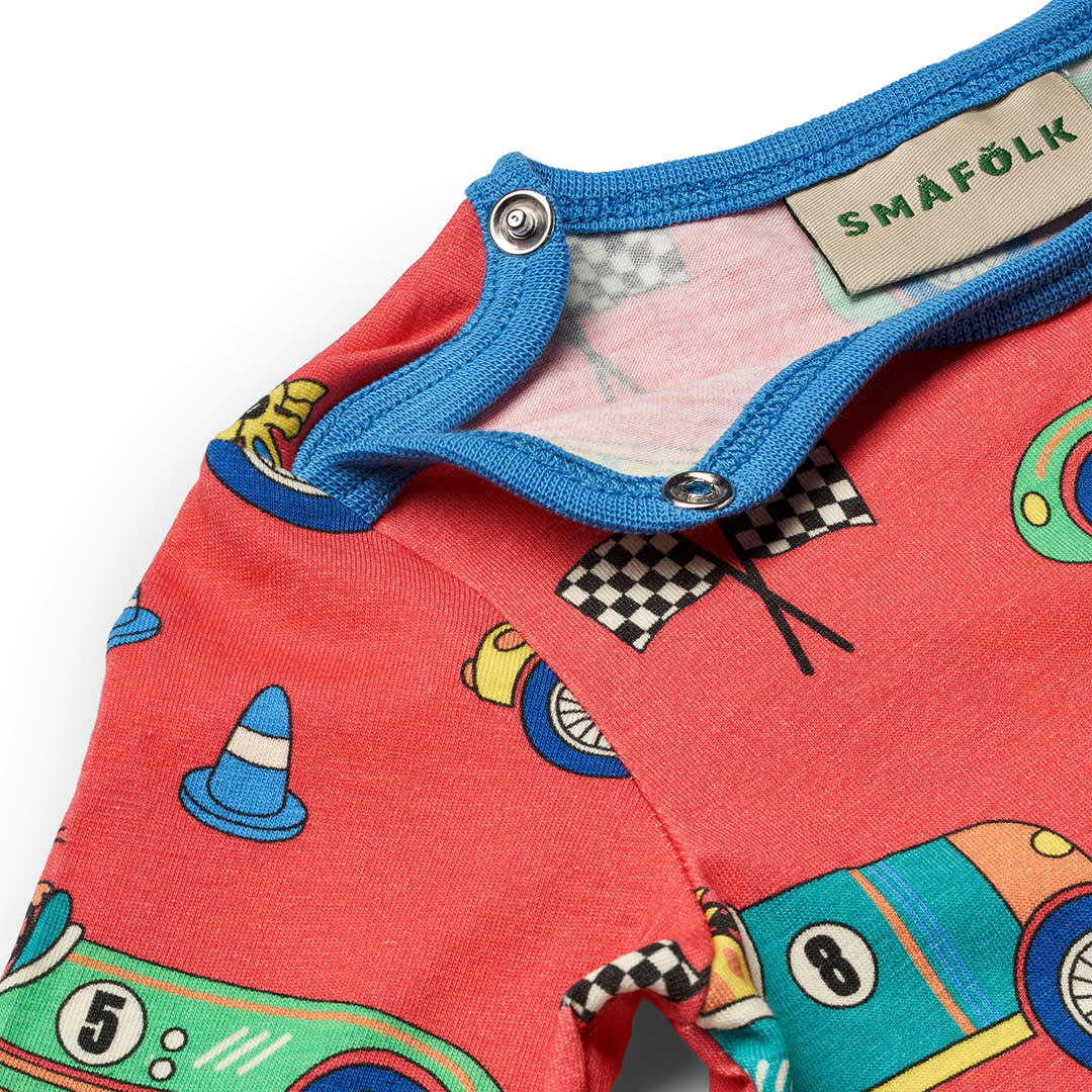 Long-sleeved all-in-one with racing cars
