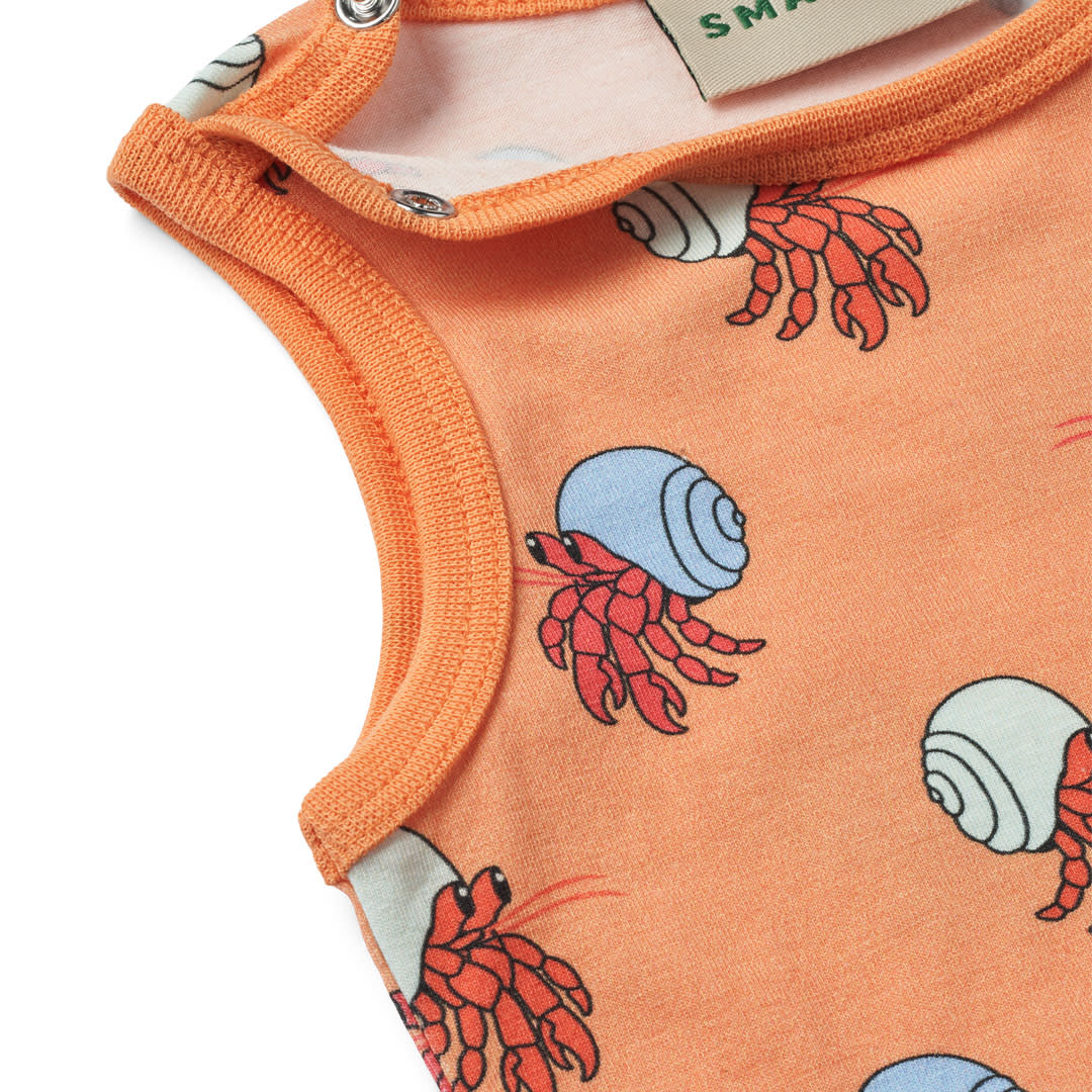 Sleeveless all-in-one with hermit crabs