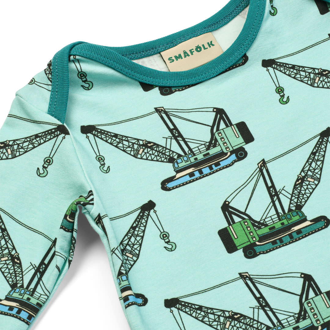 Ulm long-sleeved onesie with crane machinery