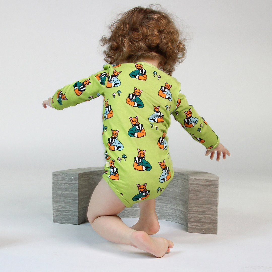 Long-sleeved bodysuit with badger cubs and fox cubs