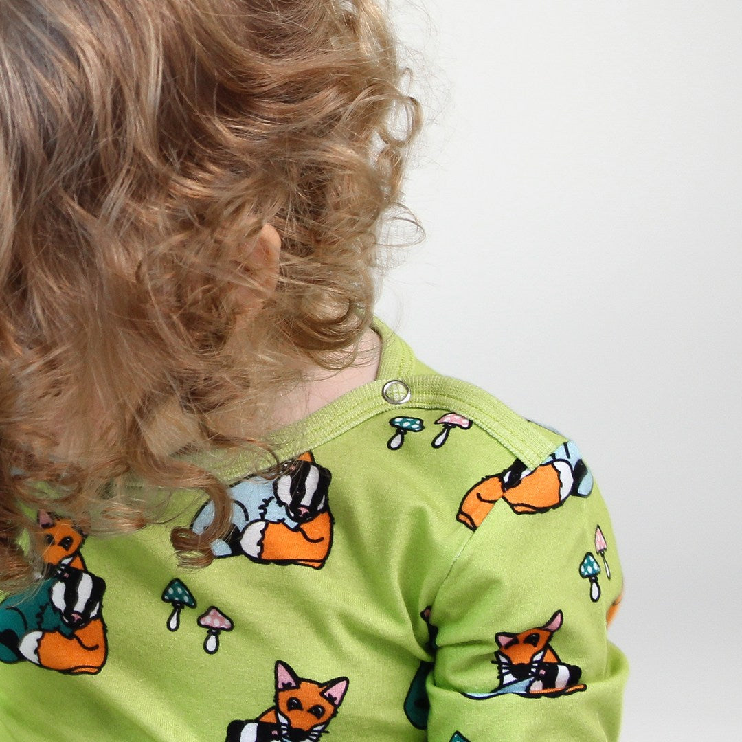 Long-sleeved bodysuit with badger cubs and fox cubs